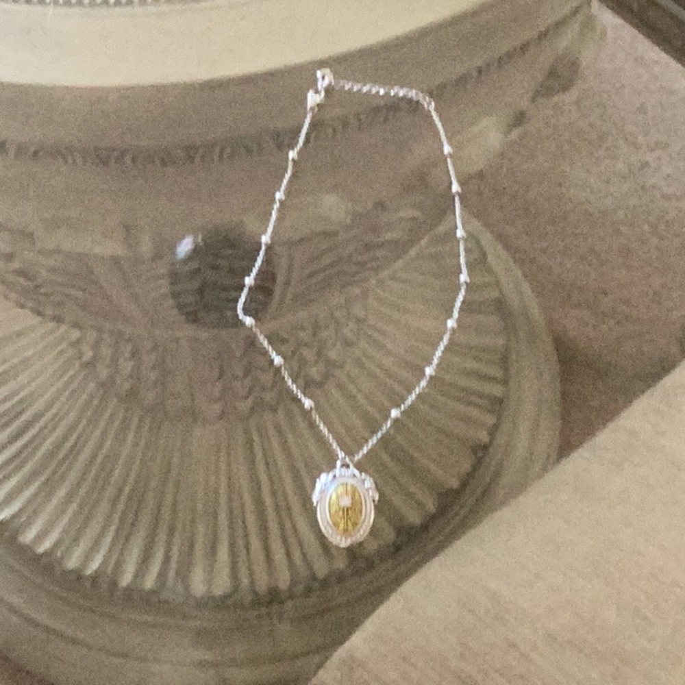 Brighton Necklace with faux Pearls on the chain. This Necklace has a Pendant on